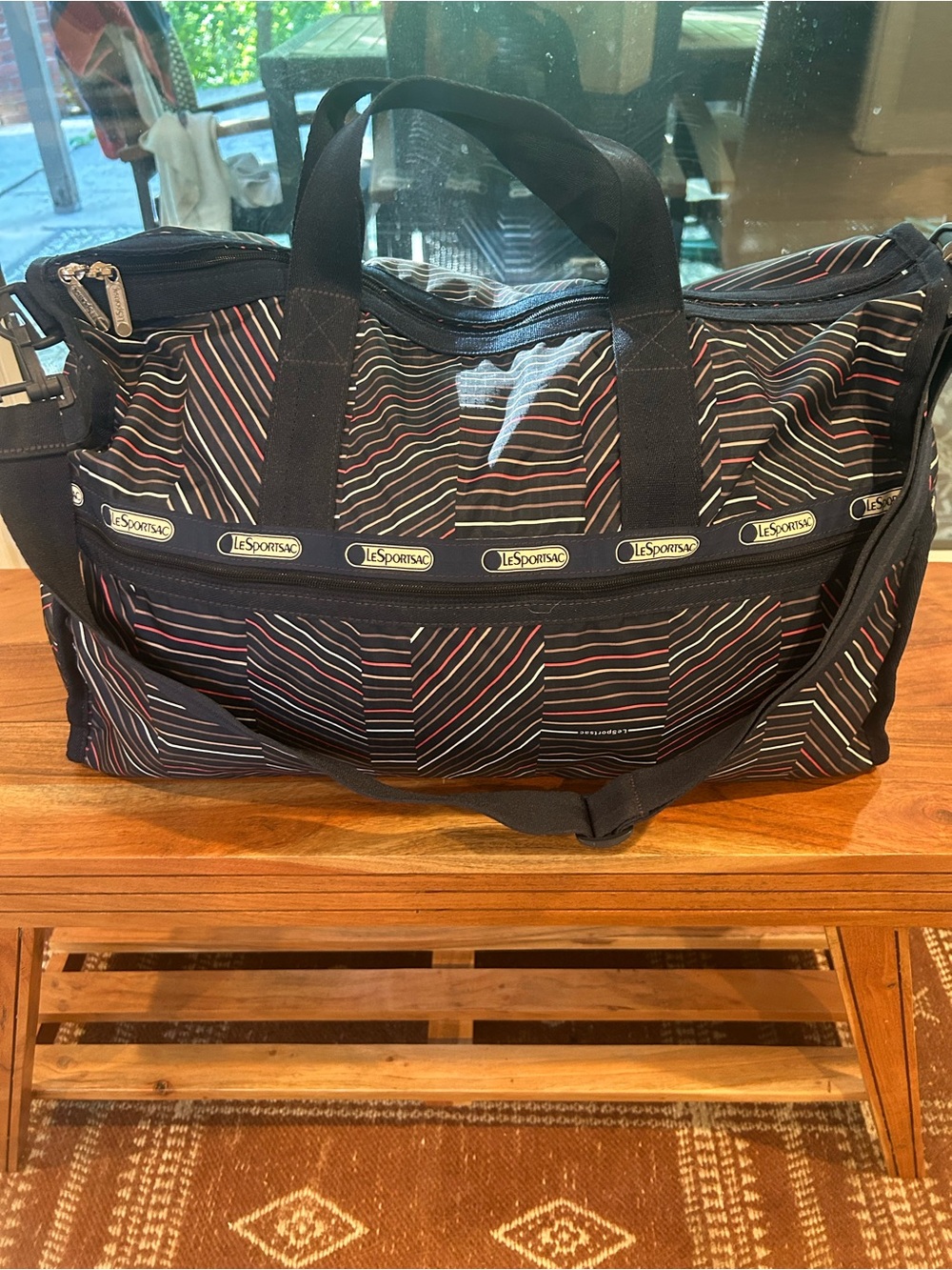 LeSportsac Navy Duffel Weekender Bag with Multicolor Pinstripes